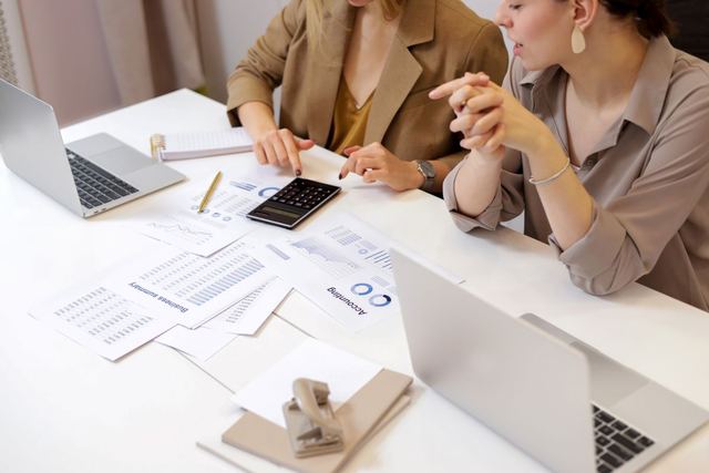 Advisers reviewing a business plan together